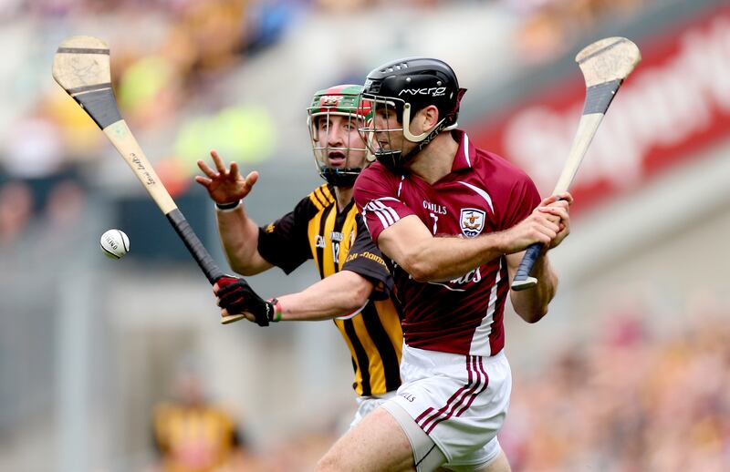 Galway's David Collins and Eoin Larkin of Kilkenny go hell for leather during the 2012 All-Ireland SHC final. Photograph: James Crombie/Inpho