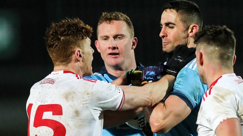 Tyrone’s Conor Meyler and Dublin’s James McCarthy scuffle on the pitch during their Allianz Football League Division 1 game at  Healy Park, Omagh on Saturday. Photograph: Tommy Dickson/Inpho