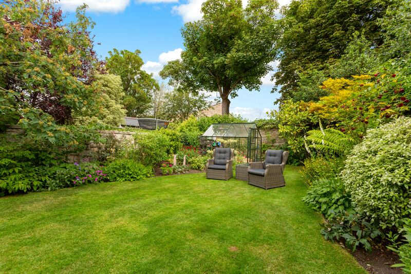 The rear garden backs on to Sandford Park school. Photograph: Keith Owens