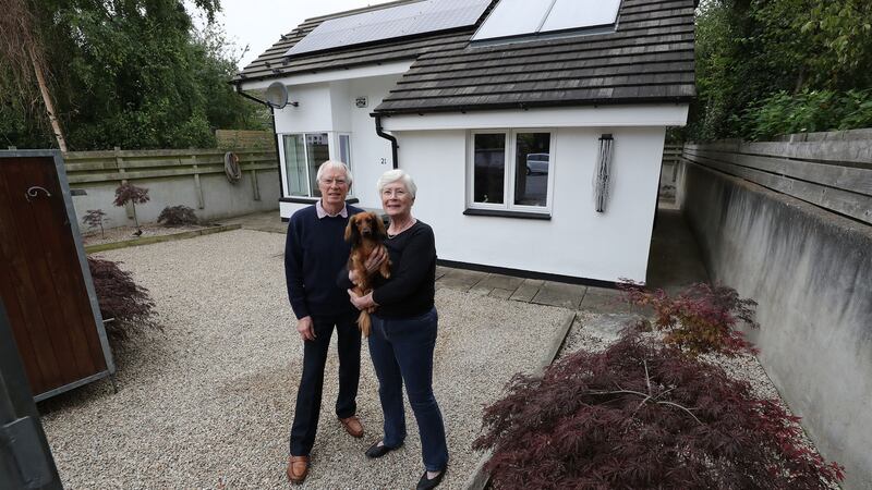 Sarah and Tim Jackson with Maisie at their bunglaow. Photograph: Nick Bradshaw