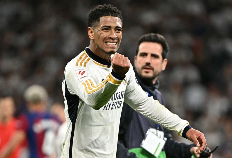 Jude Bellingham celebrates victory at the end of the Spanish league football match between Real Madrid CF and FC Barcelona at the Santiago Bernabeu stadium in Madrid. Photograph: Javier Soriano/AFP via Getty Images
