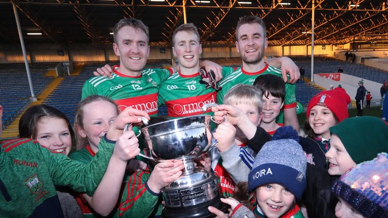 Loughmore-Castleiney’s Noel, Brian and John McGrath with young fans lifting the O’Dwyer cup at Semple Stadium on November 21st. Photograph: Tom Maher/Inpho