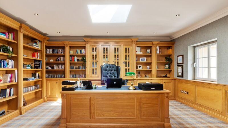 Wood-panelled study.