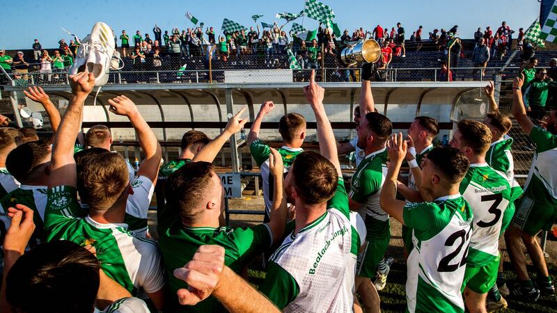 Baltinglass celebrate with the trophy after their win against Tinahely in the Wicklow SFC final in Aughrim. Photograph: Ryan Byrne/Inpho