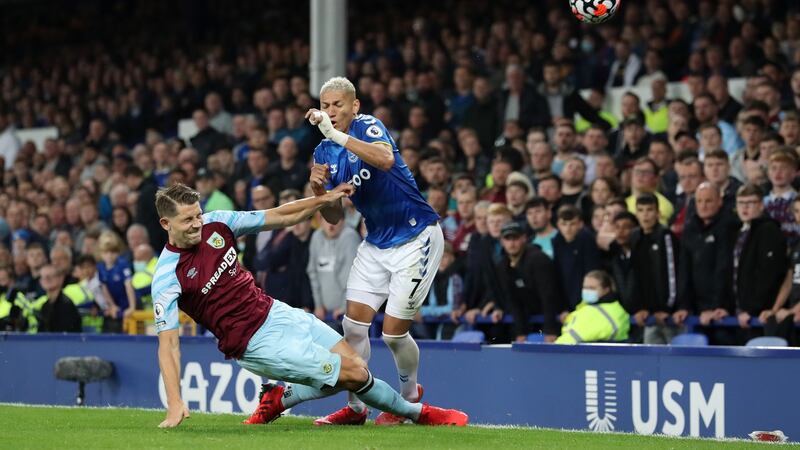 Everton’s Richarlison is challenged by James Tarkowski of Burnley. Photograph: Jan Kruger/Getty Images