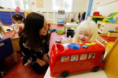 Lorna Walker with Layla at the Montessori. Photograph: Alan Betson