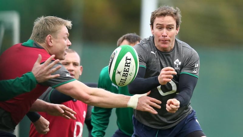 Scrumhalf Eoin Reddan gets his pass away during yesterday’s Ireland squad training session at their base in Carton House in Co Kildare. Photograph:  Billy Stickland/Inpho