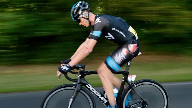 Defending champion Chris Froome of Sky Procycling shows the scars of his crash on stage 3 of the Tour de France   between Le Touquet-Paris-Plage and Lille Metropole. Photograph: Kim Ludbrook