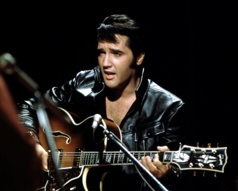 Elvis Presley performing on a TV special in June 1968. Photograph: Michael Ochs Archives/Getty Images