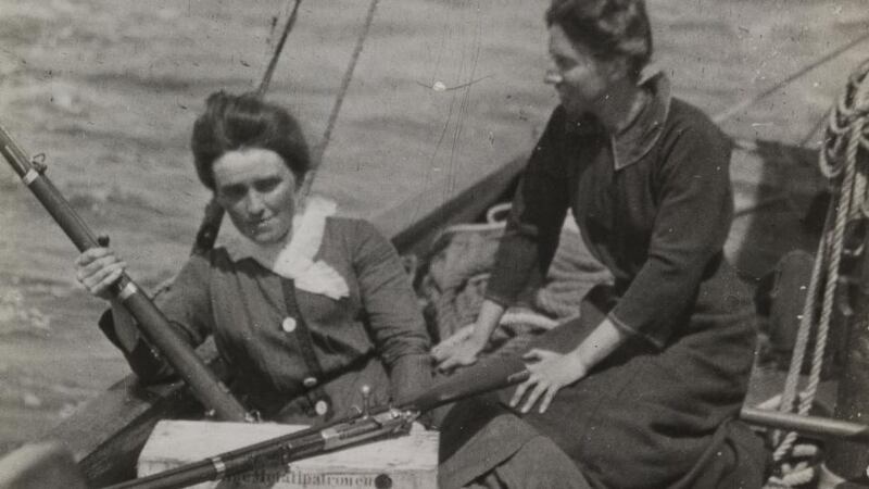 Molly Childers (left) with Mary Spring Rice and guns on board the Asgard. Photograph: Trinity College Dublin