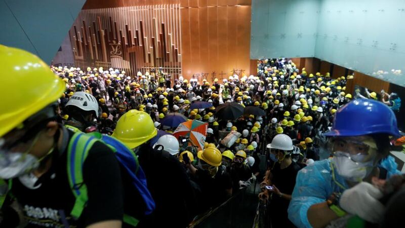 Protesters break into the legislative council building during the anniversary of Hong Kong’s handover to China in Hong Kong on Monday. Photograph: Reuters/Stringer