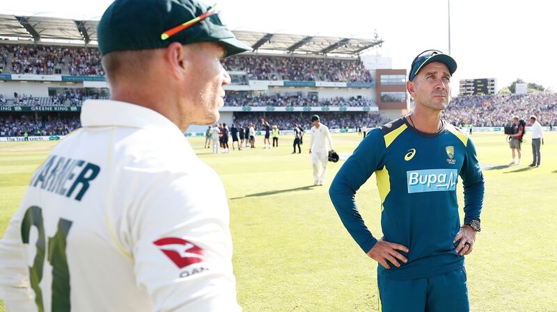 David Warner and head coach Justin Langer after Australia’s defeat in Leeds. Photograph: Ryan Pierse/Getty