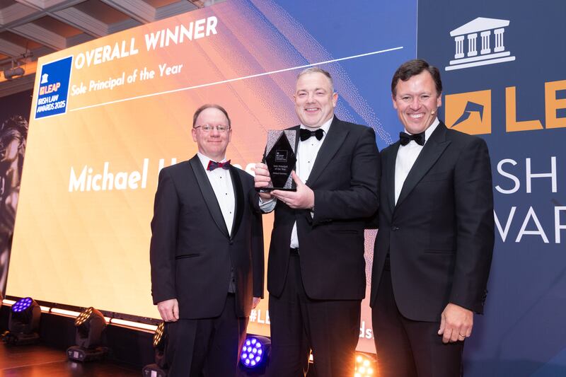 Richard Hammond, solicitor and partner at Hammond Good LLP and chair of the judging panel of the Leap Irish Law Awards; Michael Hennessy, managing partner at Michael Hennessy Solicitors; and Anton Savage, MC of the night. Photograph: Paul Sherwood