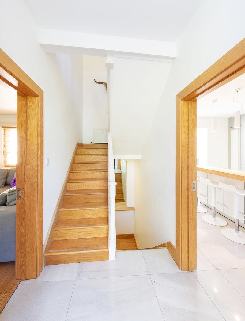 Entrance Hall: the doors, stairs and handrail are all solid oak.