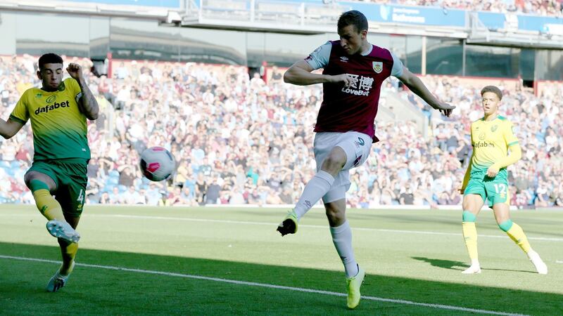 Burnley striker Chris Wood scores his second goal  during the Premier League match against  Norwich City at Turf Moor. Photograph: Nigel Roddis/Getty Images