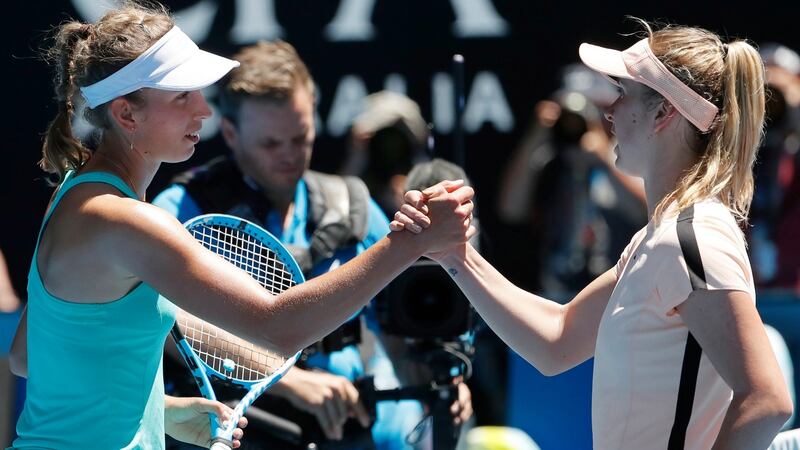 Elise Mertens and Elina Svitolina shake hands after their Australian Open quarter final clash. Photo: Mast Irham/EPA