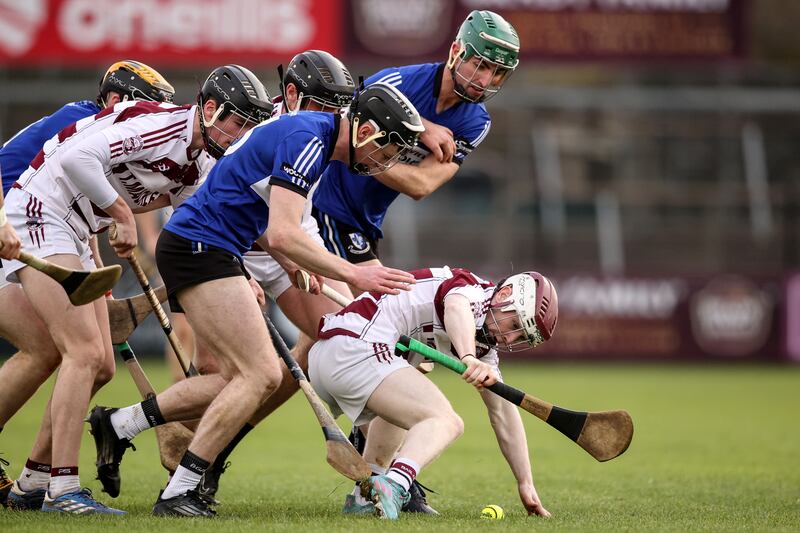 Sarsfields' Jack O'Connor and Cillian Roche with Fionn McEldowney of Slaughtneil during the game in Newbridge. Photograph: Ben Brady/Inpho