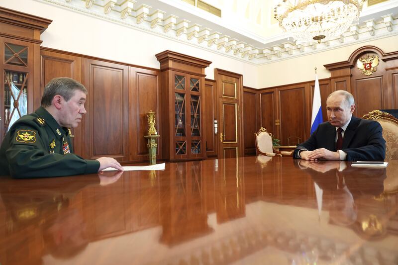 Russian president Vladimir Putin with general Valery Gerasimov in the Kremlin. Photograph: Vyacheslav Prokofyev, Sputnik, Kremlin Pool Photo via AP