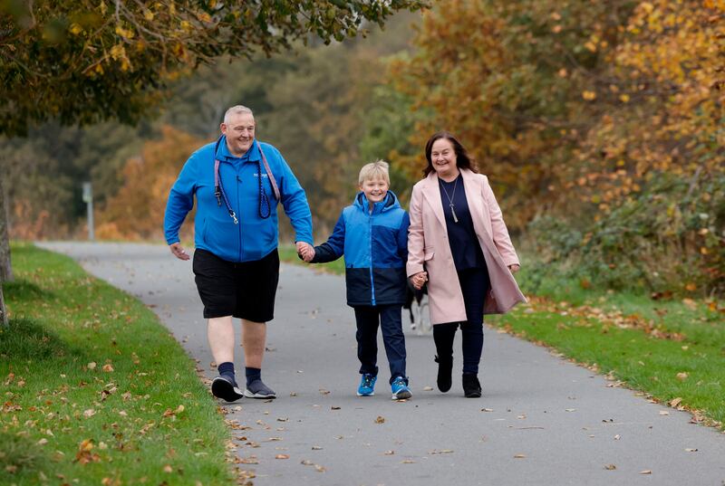 Olivia McHugh with her son Senan and partner Seamus walking at Dodder Valley Park. Photograph: Alan Betson
