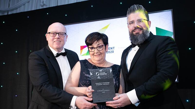 Eileen Slamon, Awards Judge presents the Innovation in Technology & Systems - End Users award to Philip Fairhurst & Miquel Vidal, CBRE