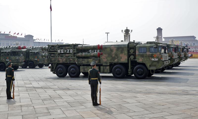 Armoured vehicles carrying the HQ-20 surface-to-air missile system. Photograph: EPA