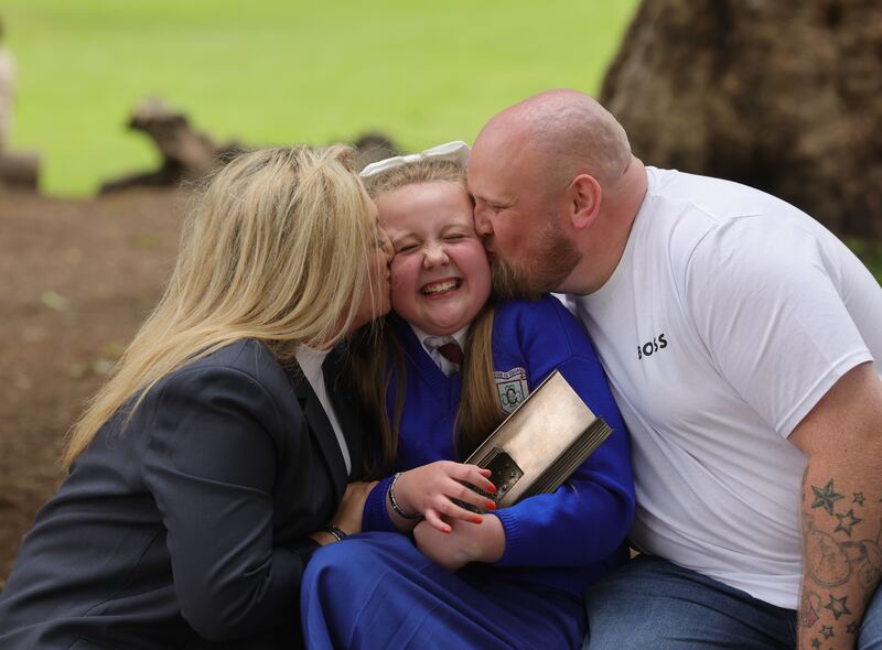 KPMG Children’s Books Ireland Awards 2024: Amy and Alan O’Donoghue, parents of Allanah O’Donoghue, fifth class student from Patrick's Girls National School, Limerick, winner of the reading hero award. Photograph: Alan Betson 