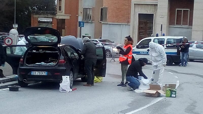 Forensics personnel inspect a car used by a gunman in Macerata, Italy, February 3rd, 2018. Photograph: Reuters
