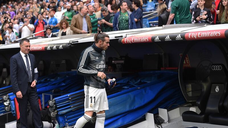 Gareth Bale  walks to the substitute bench before the La Liga match between Real Madrid  and Real Betis. Photograph: Denis Doyle/Getty Images