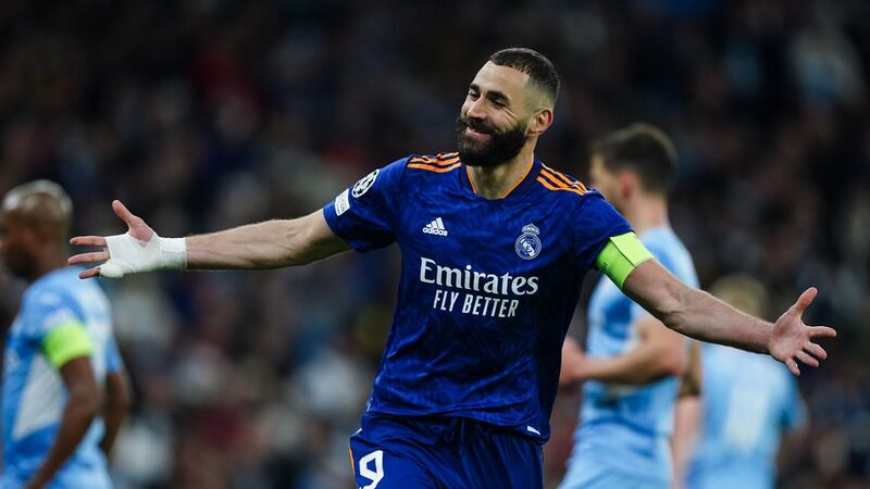 Real Madrid’s Karim Benzema celebrates scoring his team’s third goal in their Champions League semi-final first leg. Photograph: Mike Egerton/PA