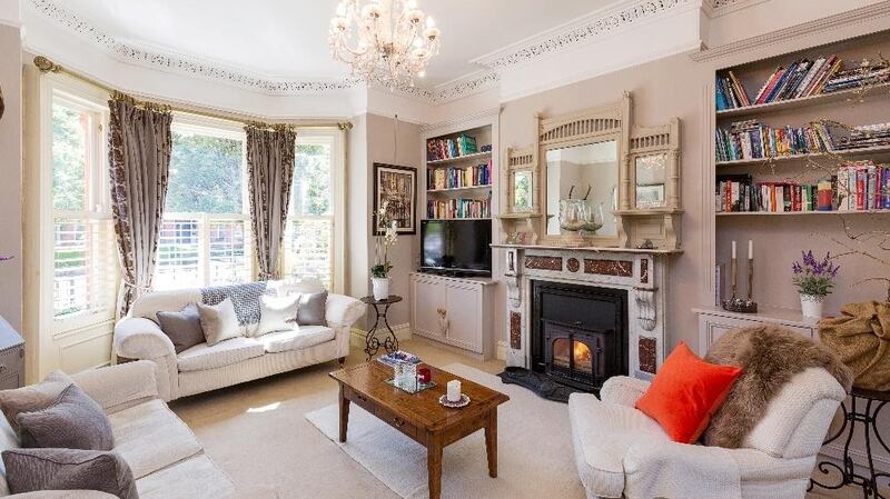 The traditionally adjoining reception rooms have an  impressive marble fireplace, original coving, centre ceiling pieces and picture rails