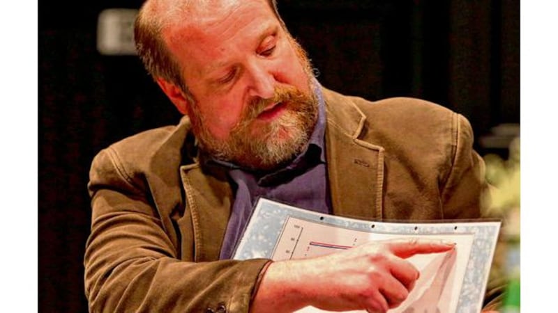 BIM's aquaculture development manager Donal Maguire at the public meeting on the proposed salmon farm. Photographs: Joe OShaughnessy