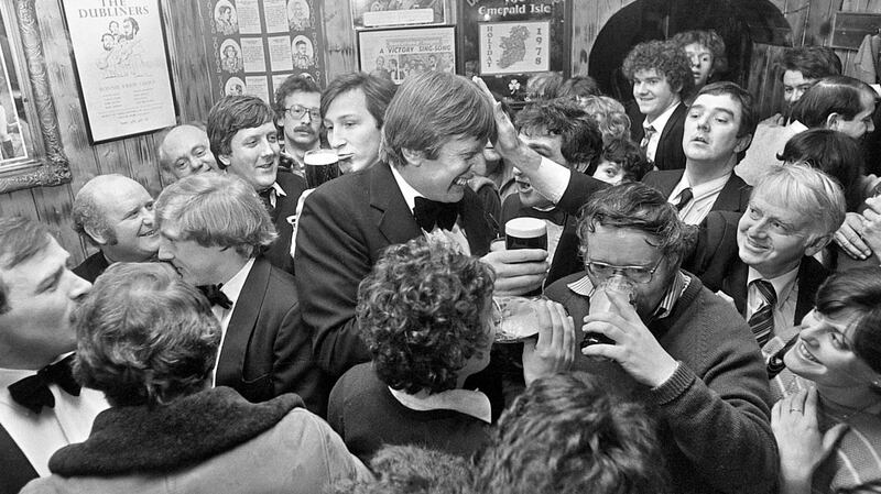 The late Ireland rugby player Moss Keane and  publican Dessie Hynes in O’Donoghue’s pub in the 1980s. Photograph:  Eric Luke