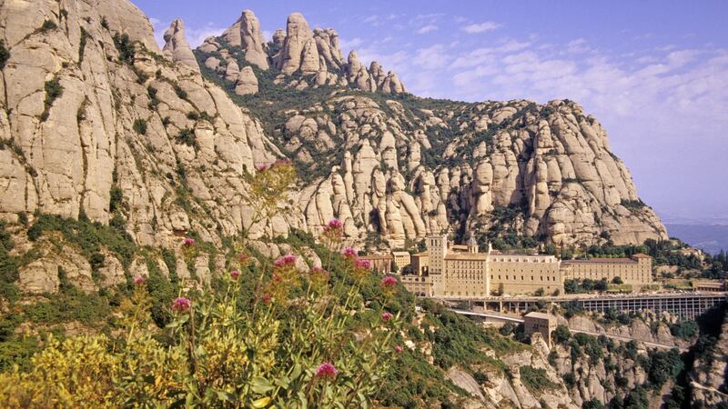 Montserrat Abbey, an hour inland (and uphill) from Barcelona, with the  image of the Virgin of Montserrat is a famous pilgrimage site in Catalonia.