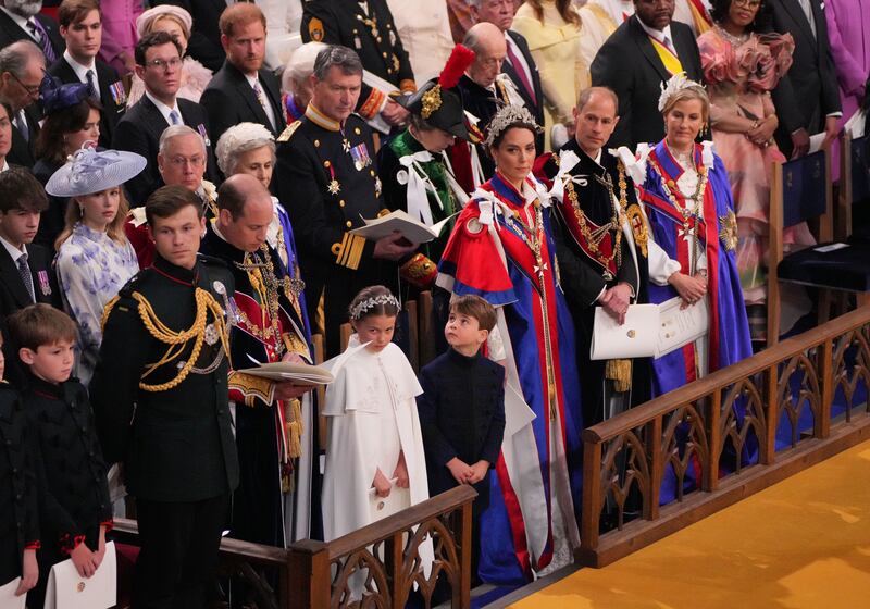 It was the first time that Harry and Meghan were seen in public together since the coronation ceremony of King Charles III and Queen Camilla in Westminster Abbey on May 6, 2023 in London, England. Prince Harry pictured here in the third row, behind his brother Prince William in the first row alongside his wife Catherine and children Charlotte and Louis. Photograph: WPA Pool/Getty Images)