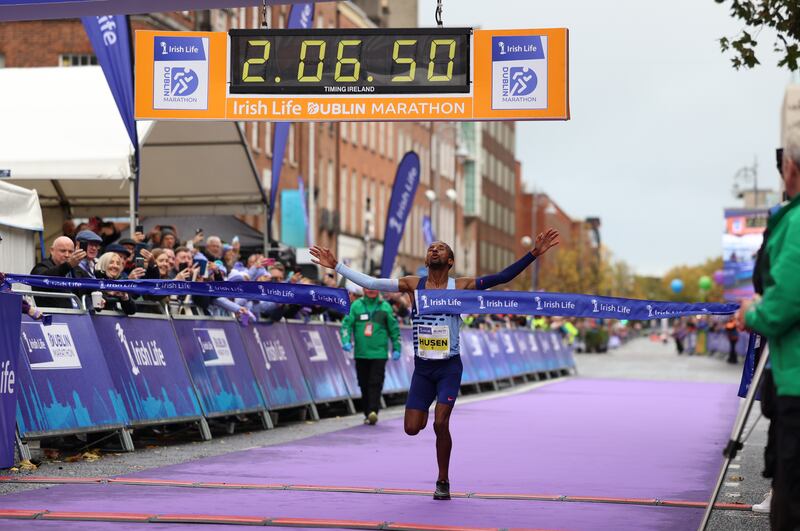 Men's winner Kemal Husen crossing the line as the winner of the 2023 Irish Life Dublin City Marathon. Photograph: Nick Bradshaw