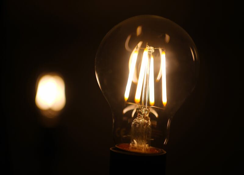 Energy-efficient light bulbs can be swapped in in place of their less effective counterparts in just a few minutes. Photograph: Yiu Mok/PA