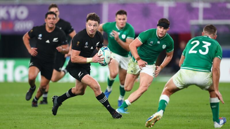 New Zealand fullback  Beauden Barrett makes the pass to set up the final try for his brother Jordie . Photograph:  Stu Forster/Getty Images