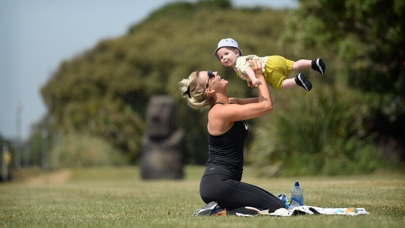 June 28th: Aoife Derwin, from Artane, with her son Mason enjoy the weather  in Clontarf, Dublin. The mercury hits its highest level since 1976 as temperatures of 32 degrees are recorded at Shannon Airport. Photograph: Dara Mac Dónaill