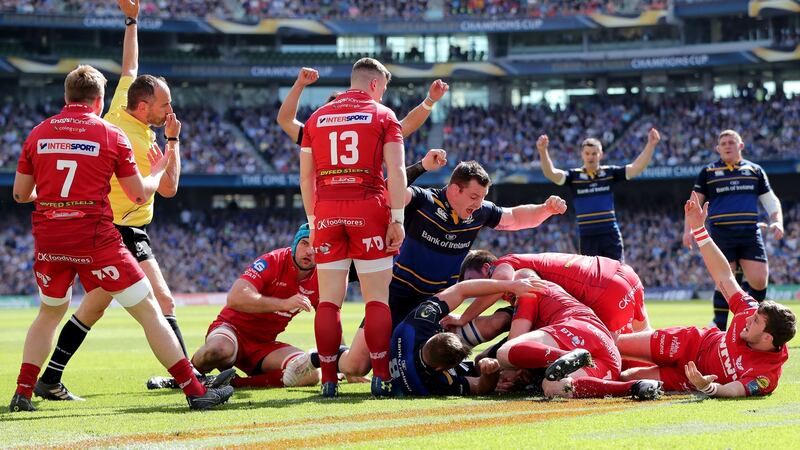 Leinster players celebrate as James Ryan scores his side’s first try against Scarlets during the European Champions Cup clash at the Aviva Stadium. Photograph: Bryan Keane/Inpho