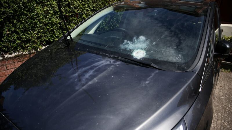 Damage done to a car at the scene of an explosive device attack on the west Belfast home of former Sinn Féin president Gerry Adams. Photograph: Brian Lawless/PA