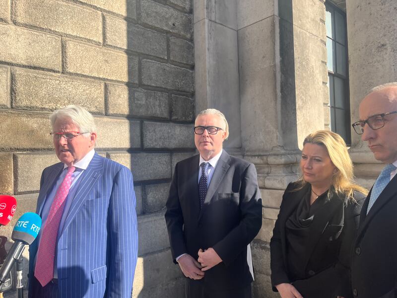 The legal representative of the family of the late Jimmy Loughlin, Damien Tansey SC; parents Michael and Paula Loughlin, and ADVIC (Advocates for Victims of Homicide) representative John Deane O'Keeffe speaking at the Four Courts in Dublin following the HSE apology. Photograph: Ellen O'Riordan