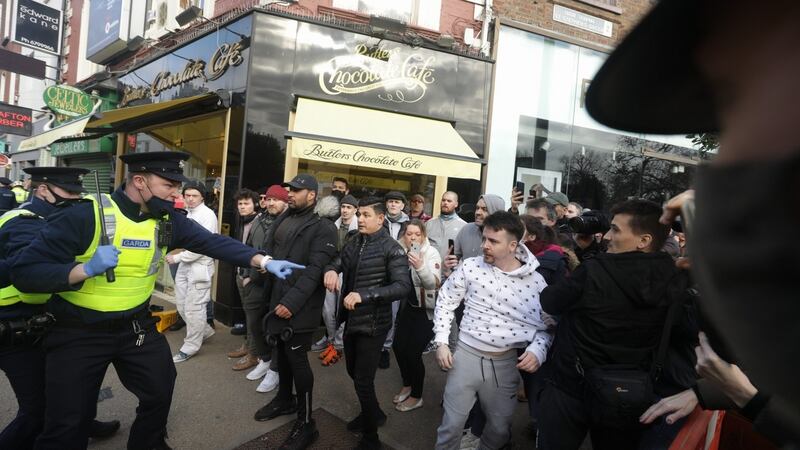 Gardaí address protesters during an anti-lockdown demonstration in Dublin city centre. Photograph: Damian Eagers/PA Wire