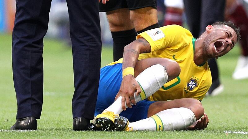 Neymar  goes down injured during the World Cup  Round of 16 match between Brazil and Mexico at Samara Arena. Photograph: Buda Mendes/Getty Images