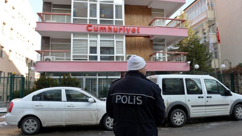 A  January 2015 photograph shows a police officer standing guard outside the Ankara offices of the daily Cumhuriyet, the leading pro-secular Turkish newspaper. Photograph: Adem Altan/AFP/Getty Images