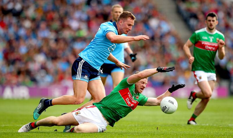 Dublin's Ciaran Kilkenny and Colm Boyle of Mayo
at the 2019 All-Ireland semi-final. Photograph: Ryan Byrne/INPHO