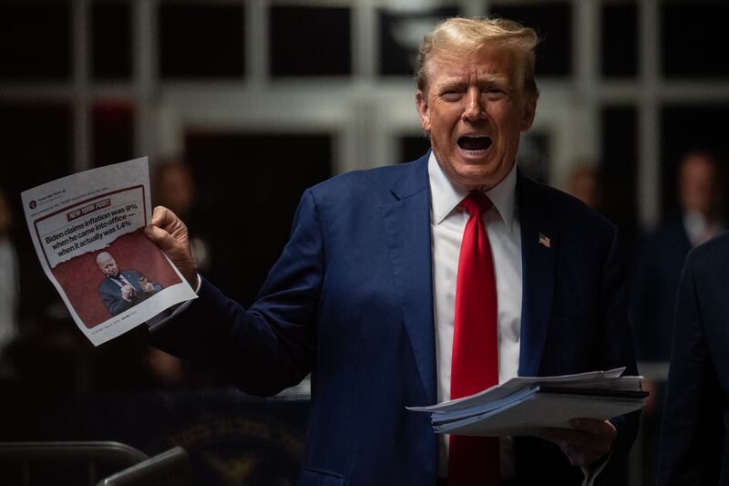 Former US president Donald Trump speaks to the media during his  criminal trial for allegedly covering up hush money payments. Photograph: Jeenah Moon - Pool/Getty Images