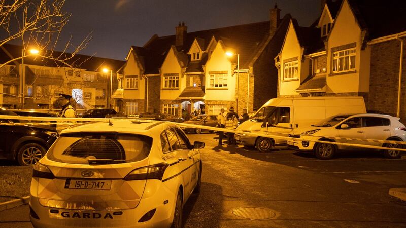 Gardaí at the scene on Parson’s Court, Newcastle, Co Dublin where the bodies of three children were discovered. Photograph: Colin Keegan, Collins Dublin