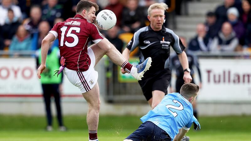 Galway’s Dessie Connelly has a shot blocked by Darren Byrne of Dublin. Photograph: Tommy Dickson/Inpho