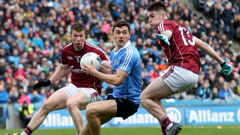 Dublin’s Shane Carthy in action against  Gareth Bradshaw and Barry McHugh of Galway during the Allianz Football League Division One Final at Croke Park. Photograph: Bryan Keane/Inpho