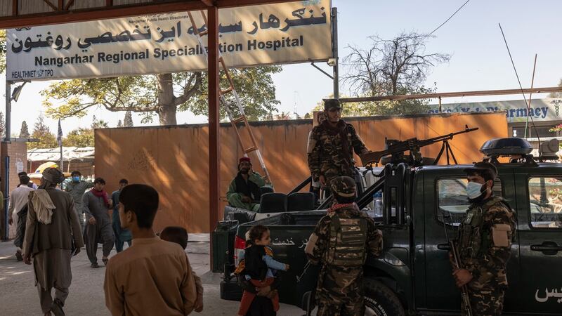 Taliban fighters stand guard at a hospital in Jalalabad. Photograph: Victor J Blue/The New York Times